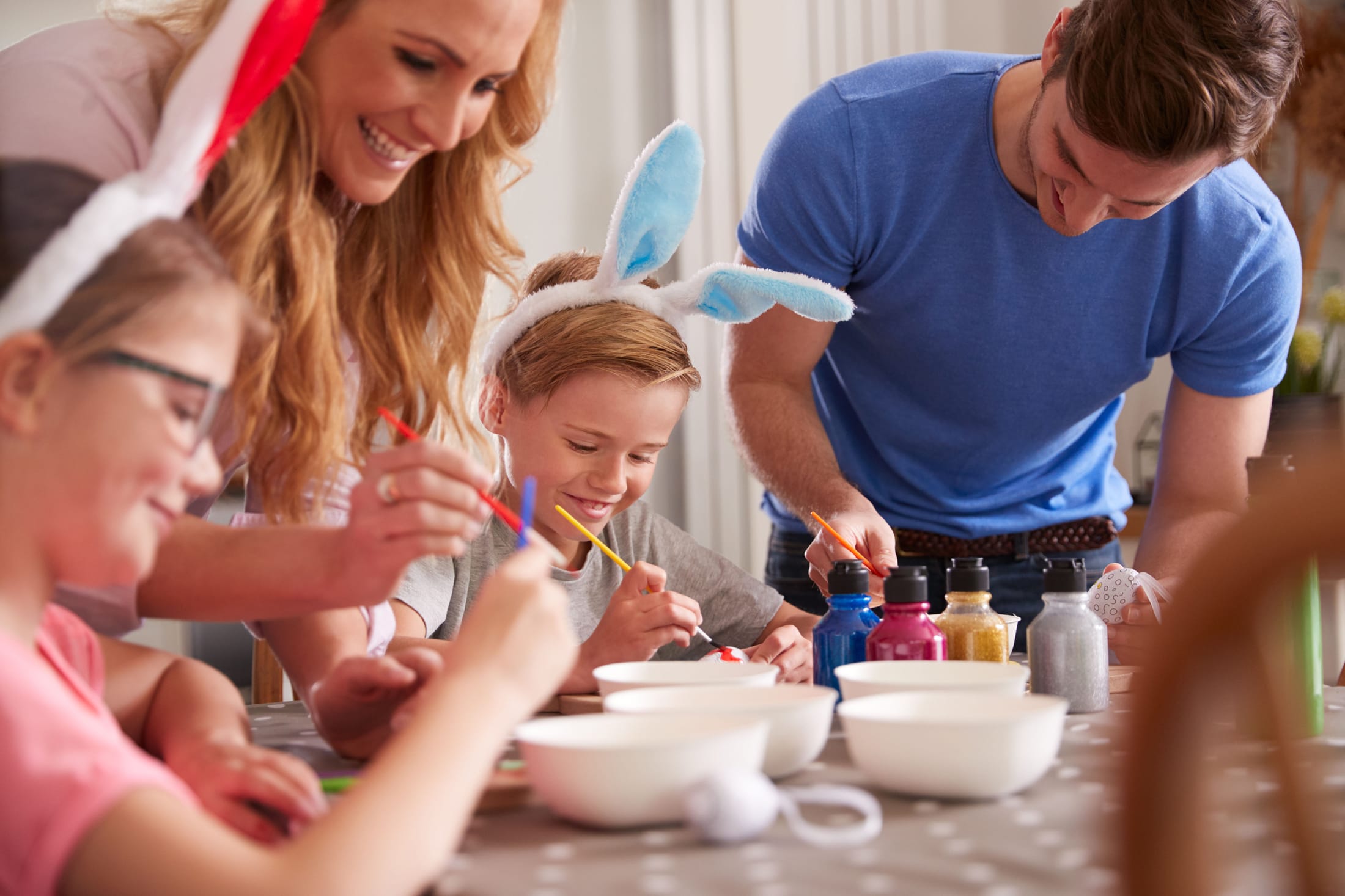 Family Decorating Eggs For Easter